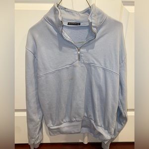 Medium brandy Melville sweatshirt in light blue.